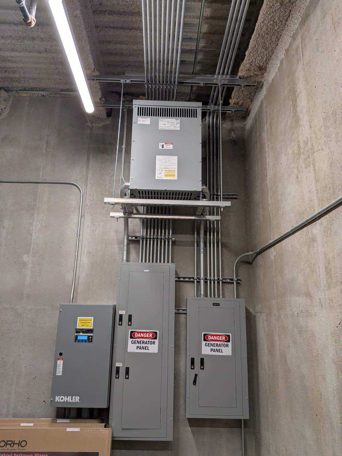 Generator transfer switch and generator panels with Kohler automatic transfer switch installed by AAA Electrical