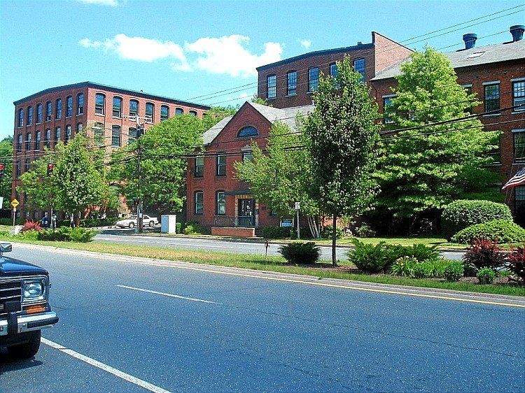 Historic brick mill buildings along Main Street in Beacon Falls, CT