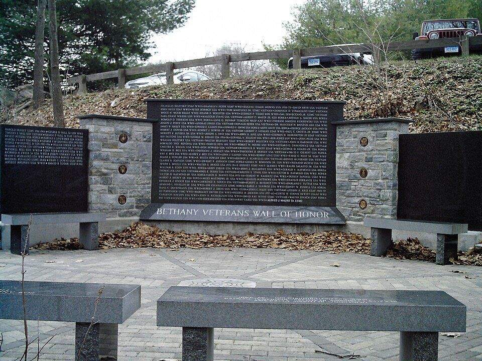 Bethany Veterans Wall of Honor memorial with granite benches