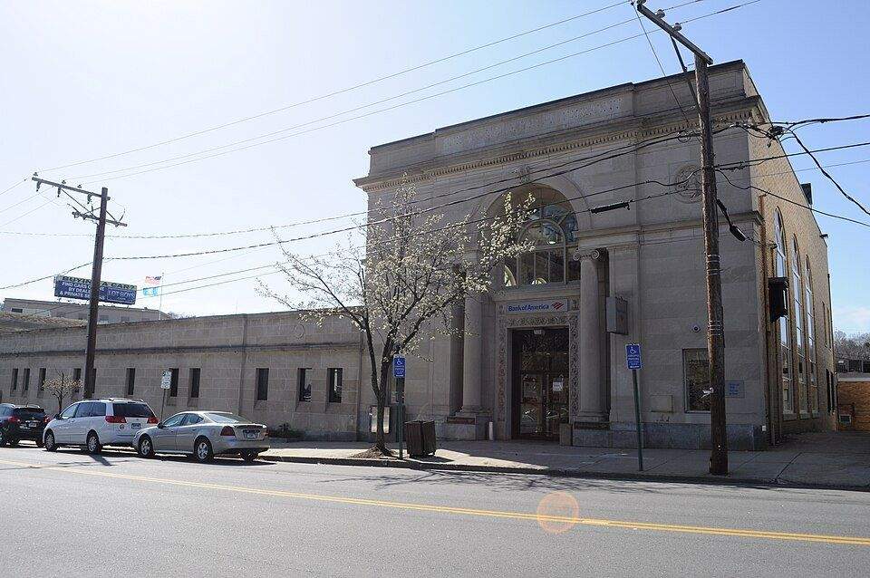 Historic bank building with ornate stone facade on Main Street in Seymour, CT